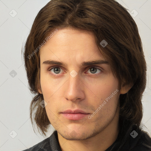 Neutral white young-adult male with medium  brown hair and brown eyes