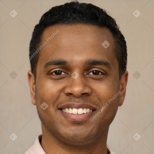 Joyful latino young-adult male with short  black hair and brown eyes