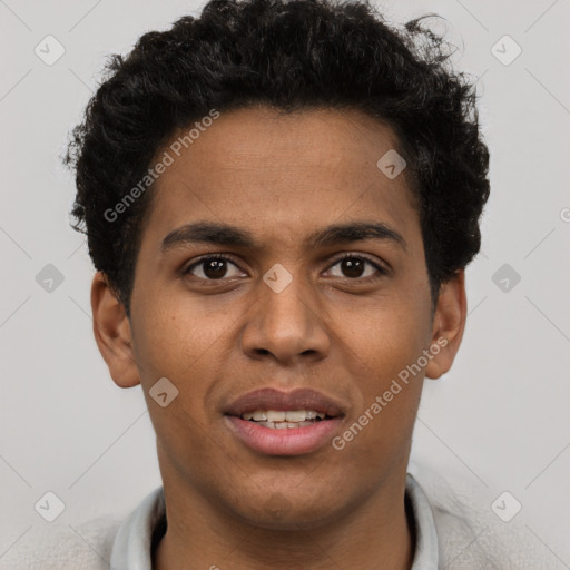 Joyful black young-adult male with short  brown hair and brown eyes