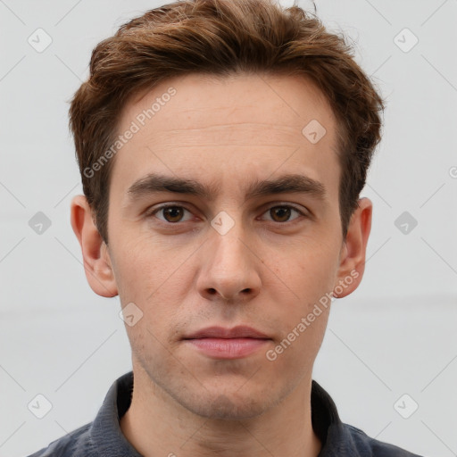 Neutral white young-adult male with short  brown hair and grey eyes