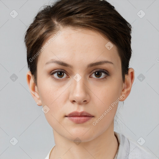 Neutral white young-adult female with short  brown hair and brown eyes