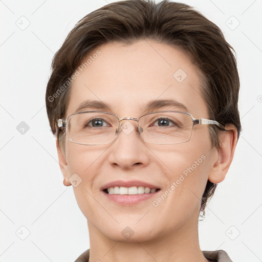 Joyful white adult female with short  brown hair and grey eyes