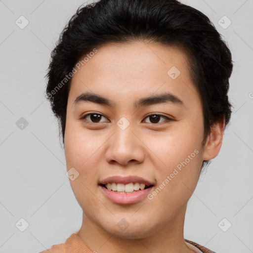 Joyful asian young-adult male with short  brown hair and brown eyes