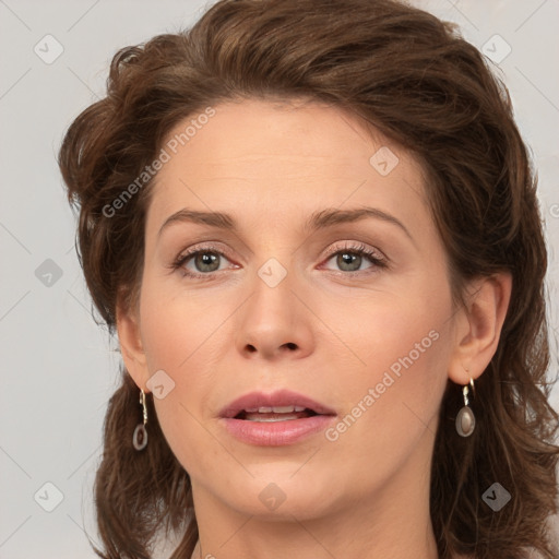 Joyful white young-adult female with medium  brown hair and green eyes