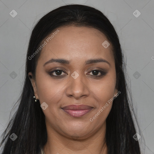 Joyful black young-adult female with long  brown hair and brown eyes