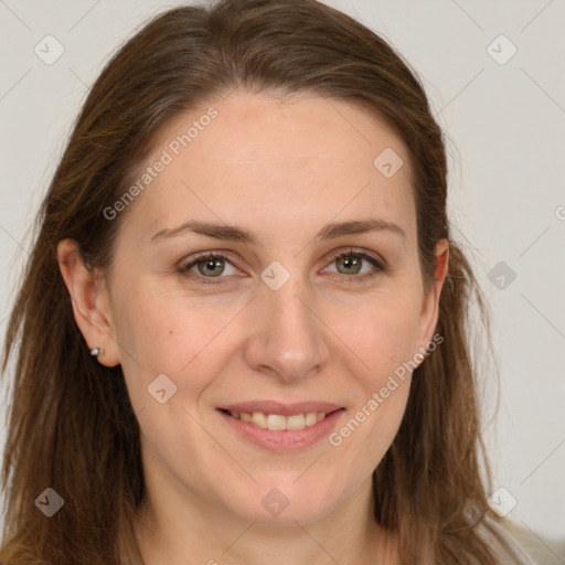 Joyful white young-adult female with long  brown hair and grey eyes