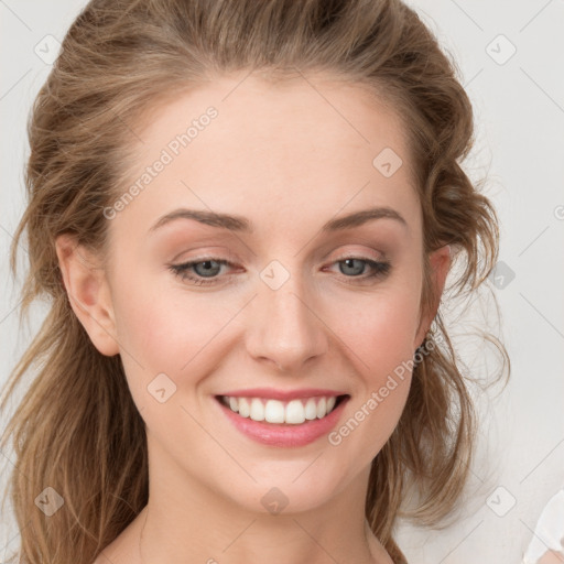 Joyful white young-adult female with medium  brown hair and blue eyes