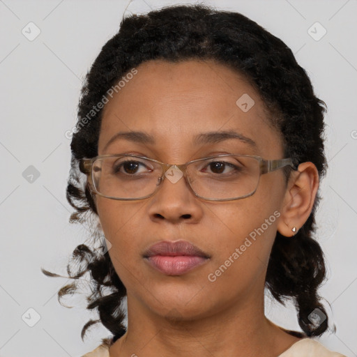 Neutral black adult female with medium  brown hair and brown eyes