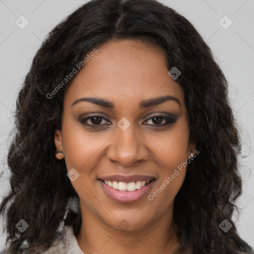 Joyful black young-adult female with long  brown hair and brown eyes