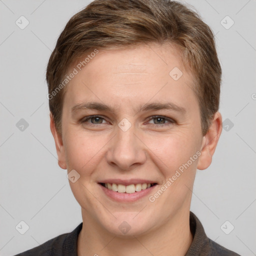 Joyful white young-adult female with short  brown hair and grey eyes