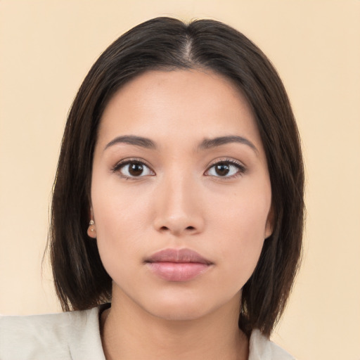 Neutral asian young-adult female with medium  brown hair and brown eyes