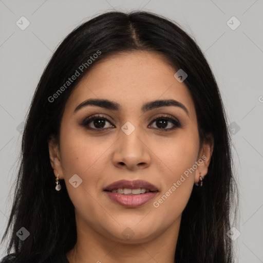 Joyful latino young-adult female with long  brown hair and brown eyes