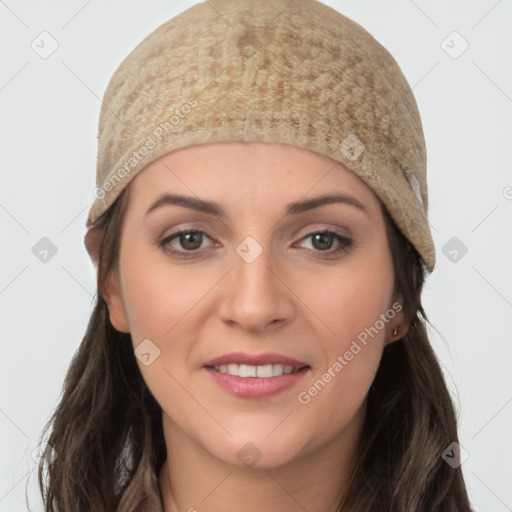 Joyful white young-adult female with long  brown hair and grey eyes