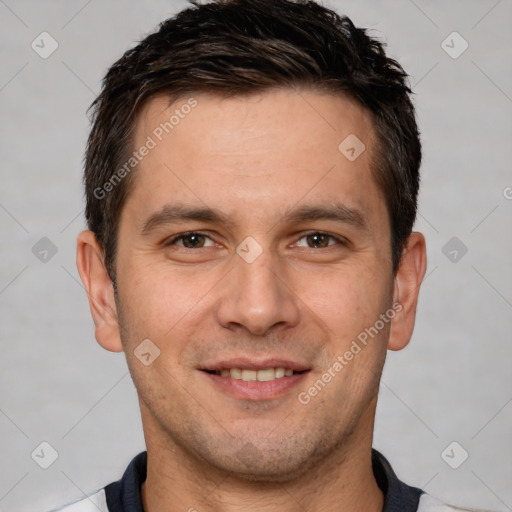 Joyful white adult male with short  brown hair and brown eyes