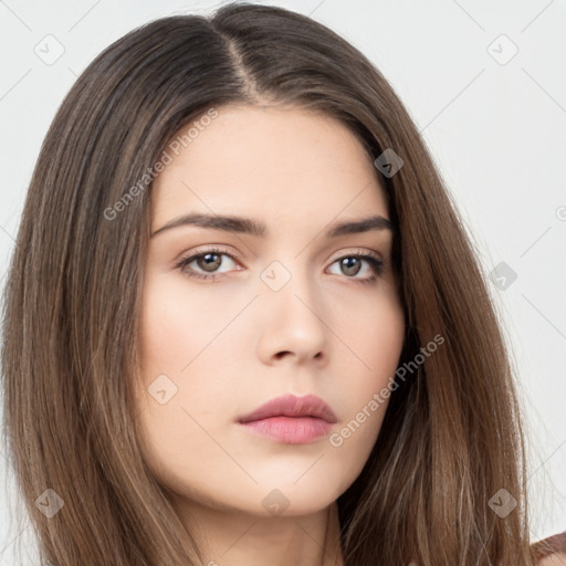 Neutral white young-adult female with long  brown hair and brown eyes