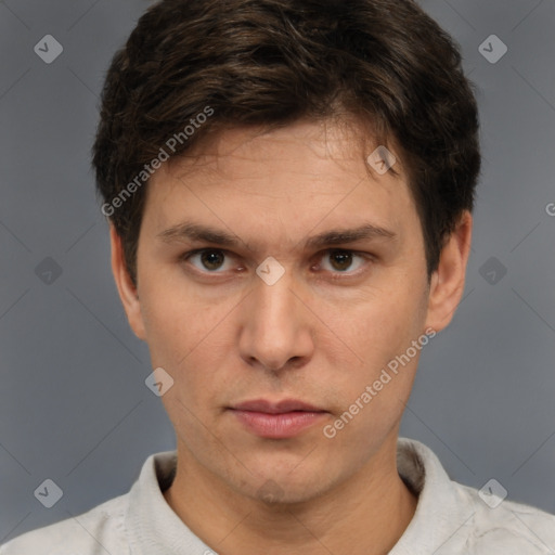 Neutral white young-adult male with short  brown hair and brown eyes