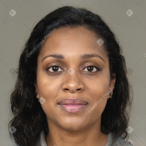 Joyful black young-adult female with medium  brown hair and brown eyes