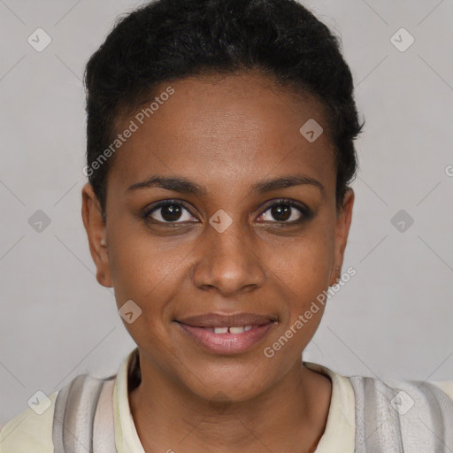 Joyful black young-adult female with short  brown hair and brown eyes