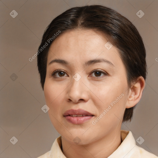 Joyful white adult female with medium  brown hair and brown eyes