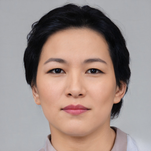 Neutral asian young-adult female with medium  black hair and brown eyes