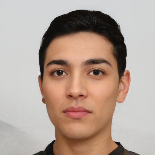 Neutral latino young-adult male with short  black hair and brown eyes