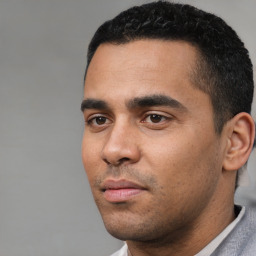 Neutral white young-adult male with short  black hair and brown eyes