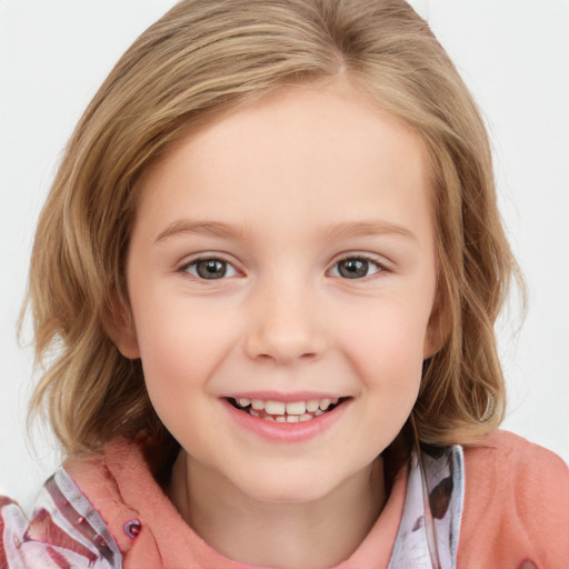 Joyful white child female with medium  brown hair and blue eyes