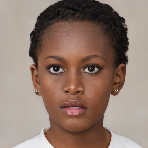 Neutral black young-adult female with short  brown hair and brown eyes