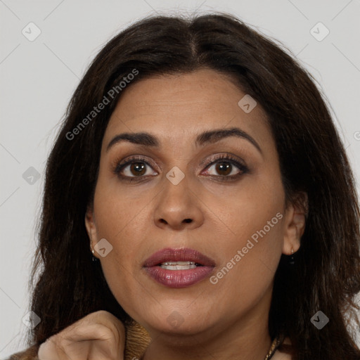 Joyful latino young-adult female with medium  brown hair and brown eyes