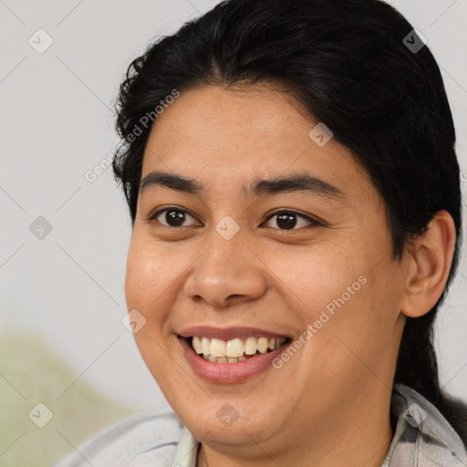 Joyful asian young-adult female with short  brown hair and brown eyes