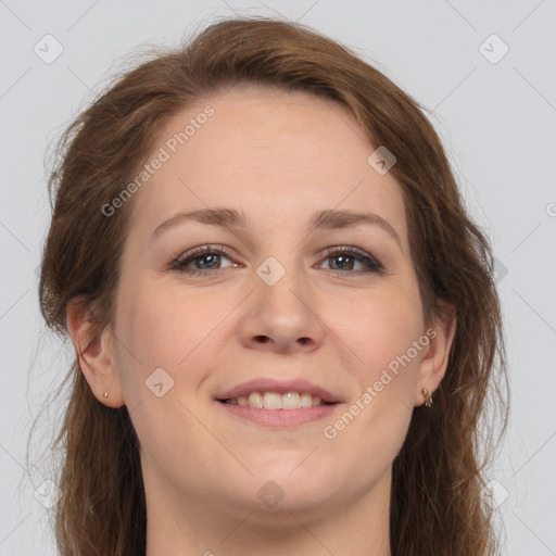 Joyful white young-adult female with long  brown hair and grey eyes