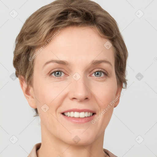 Joyful white young-adult female with short  brown hair and grey eyes