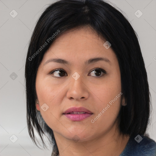 Joyful asian young-adult female with medium  black hair and brown eyes