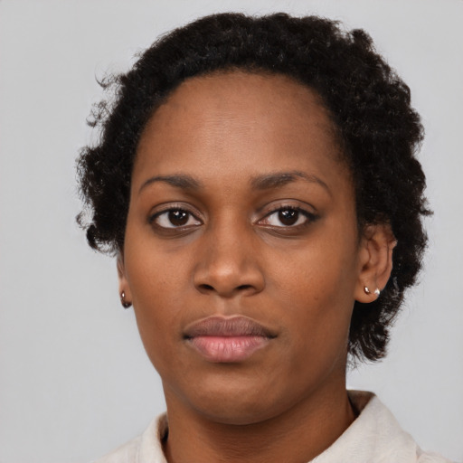 Neutral black young-adult female with short  brown hair and brown eyes