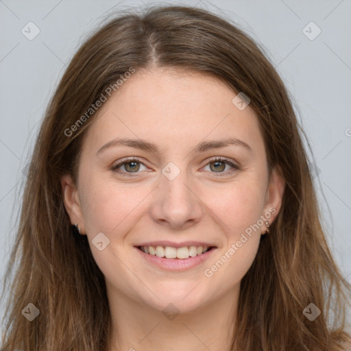 Joyful white young-adult female with long  brown hair and grey eyes