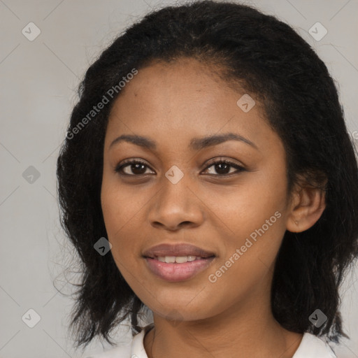 Joyful black young-adult female with medium  black hair and brown eyes