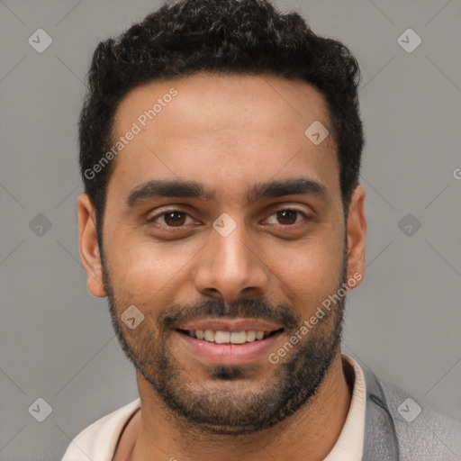 Joyful white young-adult male with short  black hair and brown eyes