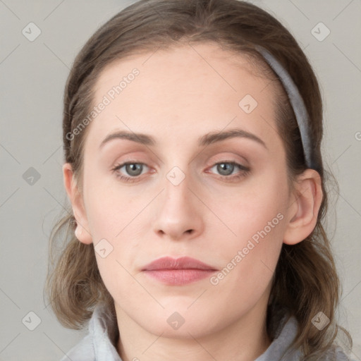 Neutral white young-adult female with medium  brown hair and blue eyes