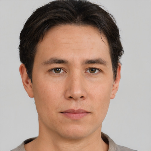 Neutral white adult male with short  brown hair and brown eyes