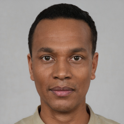 Neutral black young-adult male with short  black hair and brown eyes
