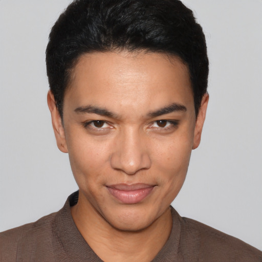 Joyful white young-adult male with short  black hair and brown eyes