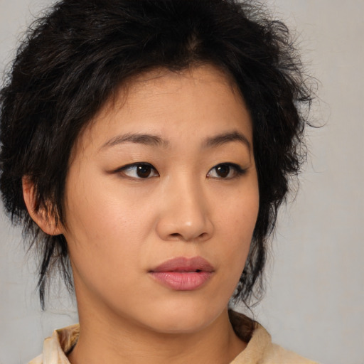 Neutral asian young-adult female with medium  brown hair and brown eyes