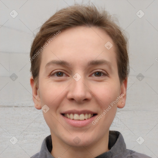 Joyful white adult female with short  brown hair and brown eyes