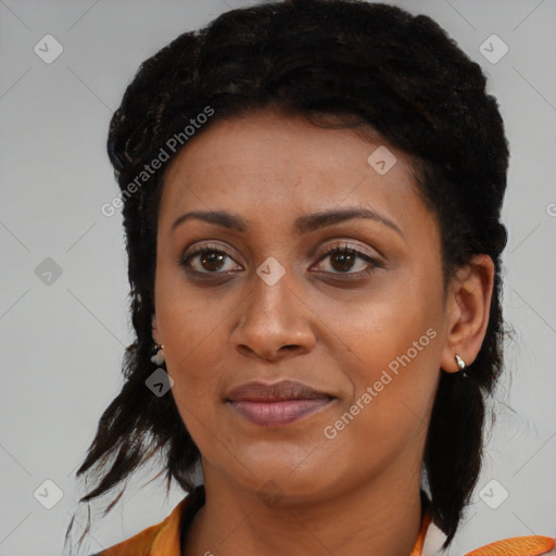 Joyful black young-adult female with medium  black hair and brown eyes
