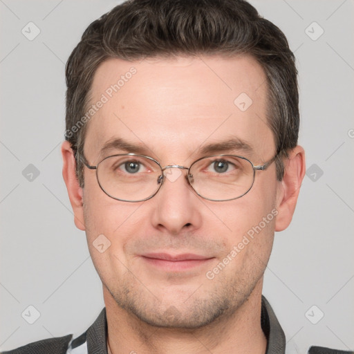 Joyful white adult male with short  brown hair and grey eyes