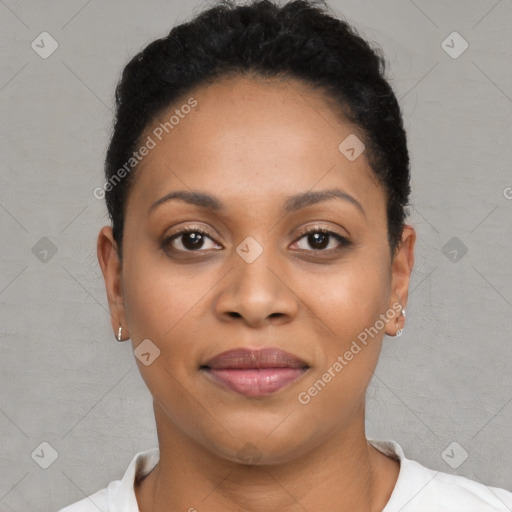 Joyful black young-adult female with short  black hair and brown eyes