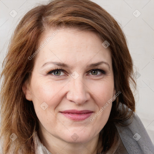 Joyful white adult female with medium  brown hair and grey eyes