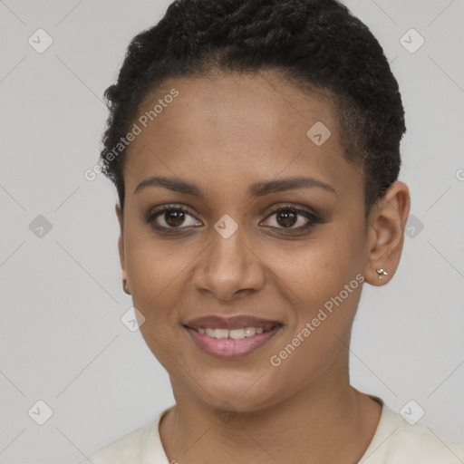 Joyful black young-adult female with short  brown hair and brown eyes