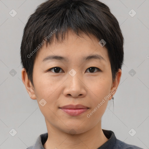 Joyful asian young-adult female with short  brown hair and brown eyes