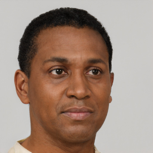 Neutral black young-adult male with short  brown hair and brown eyes